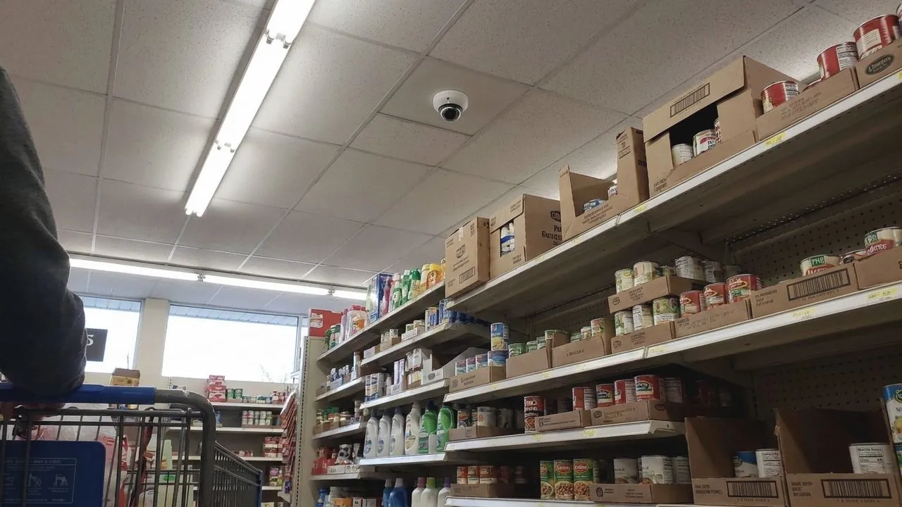 A supermarket shelving aisle.